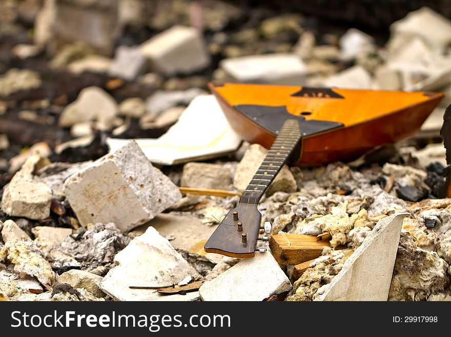 Balalaika On The Ruins Of A Destroyed House