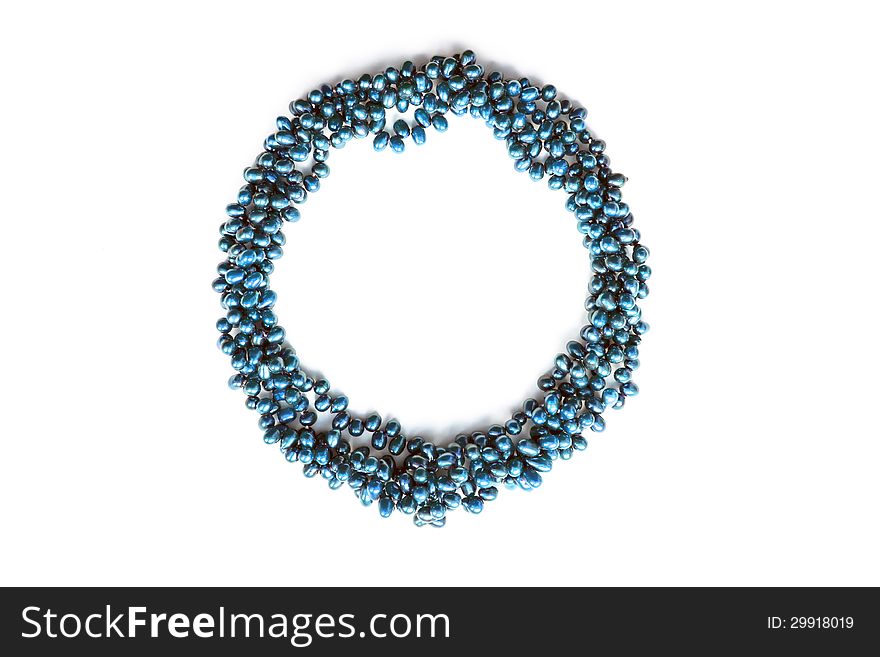 Blue pearl necklace isolated over white