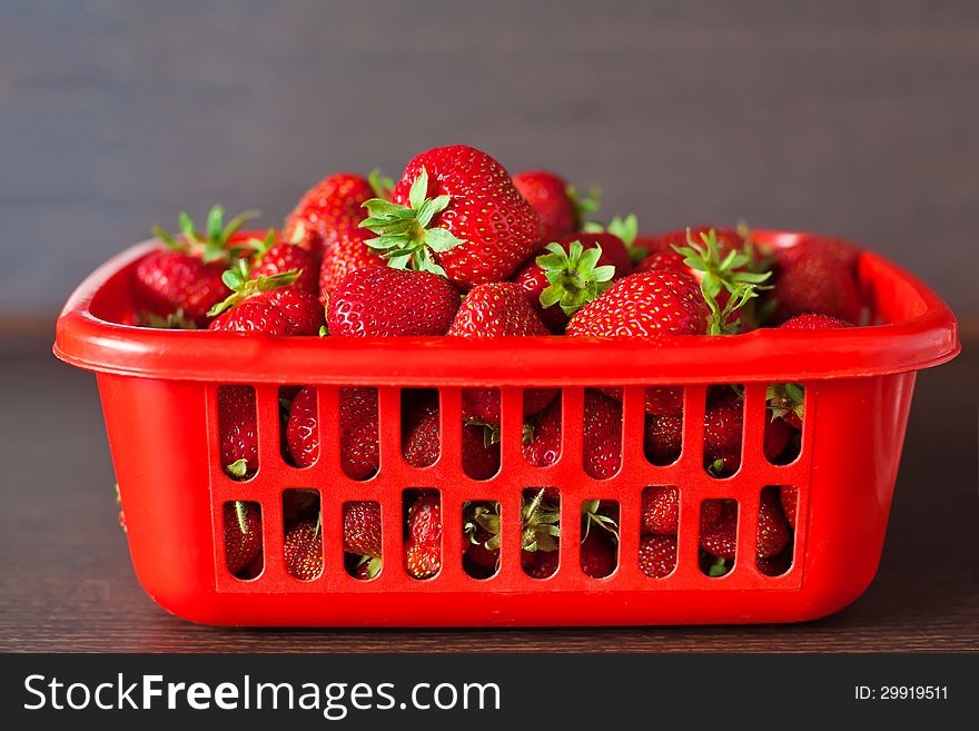 Big heap of ripe red strawberries in a box. Big heap of ripe red strawberries in a box