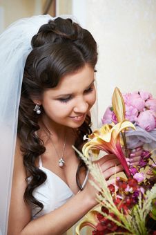 Happy Bride With Flowers Stock Images