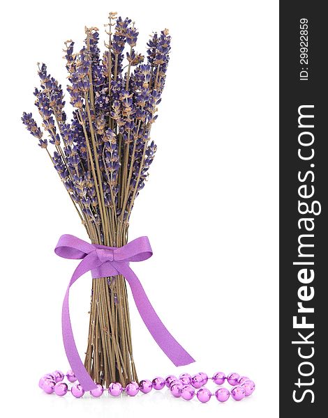 Lavender herb flower posy with lilac bead strand over white background. Lavender herb flower posy with lilac bead strand over white background.