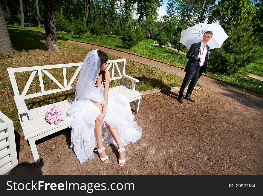 Bride and groom in park