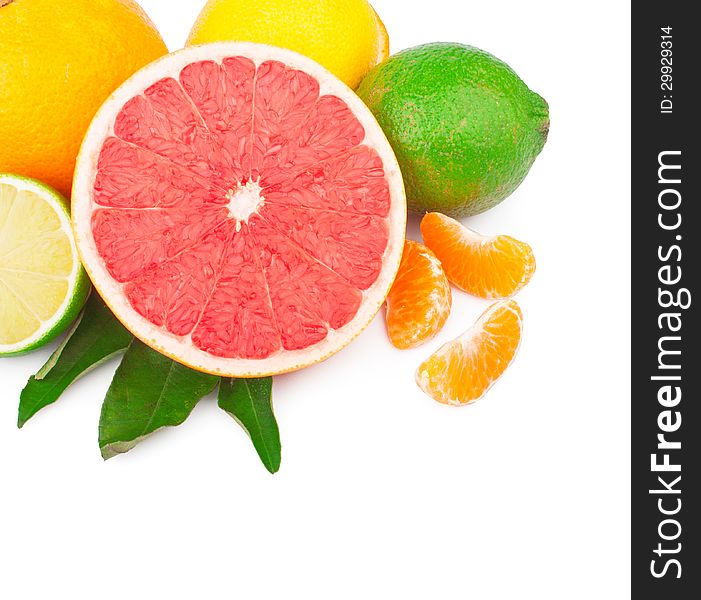 Fresh citrus fruits whole and half with green leaves, food ingredient photo