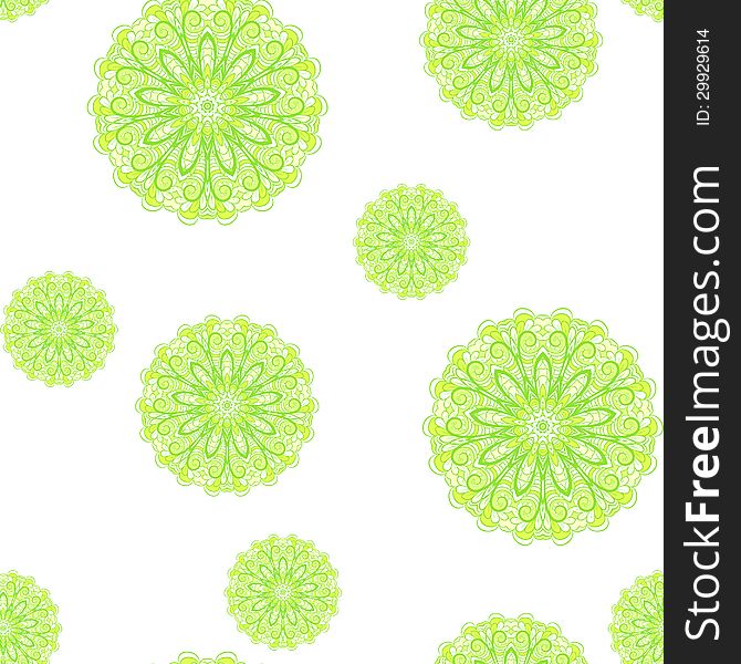 Abstract seamless pattern with green circles like as segments of lime against white background.