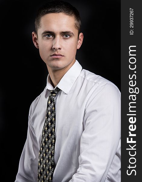 Studio portrait of young business man