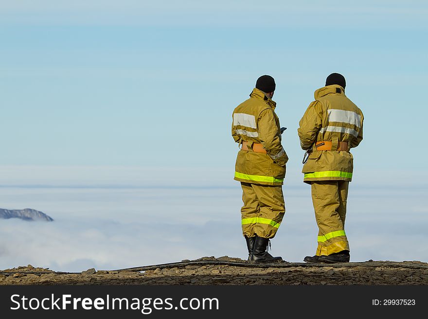 Two men on the top of the mountain