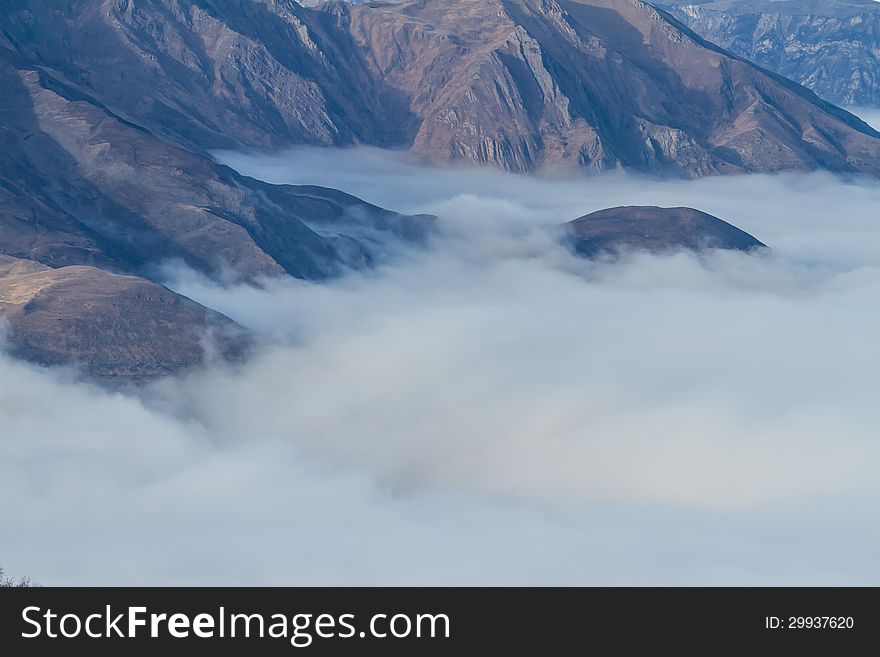 Winter mountains in the clouds