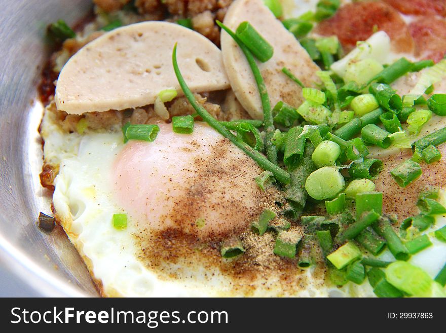 Egg fire in small pan for breakfast. Thai food style. Egg fire in small pan for breakfast. Thai food style.