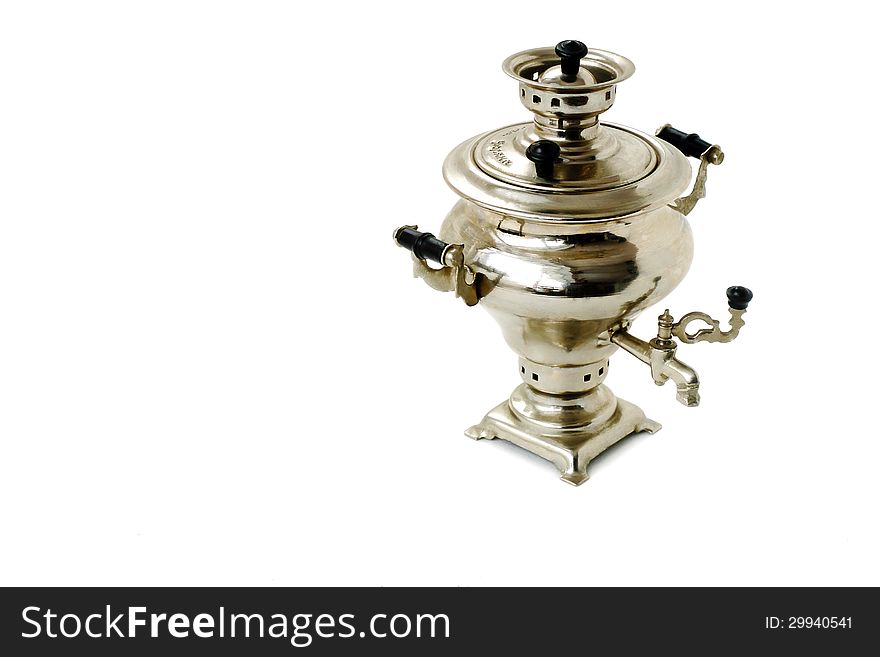 Model of the electric samovar white shiny metal on a white background in the singular. Model of the electric samovar white shiny metal on a white background in the singular.