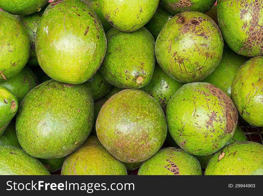 Close up avocados fruit background. Close up avocados fruit background