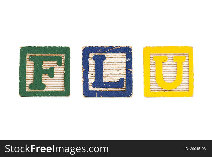 The word FLU created with children's blocks