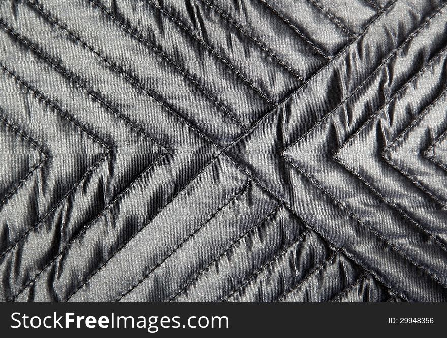 Quilted cloth texture close-up