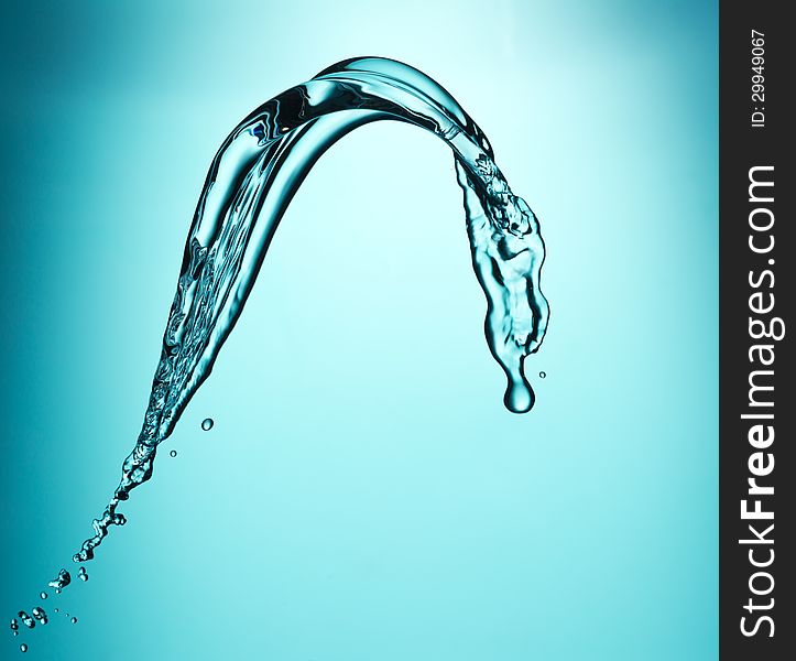 Transparent cold water splash, turquoise background