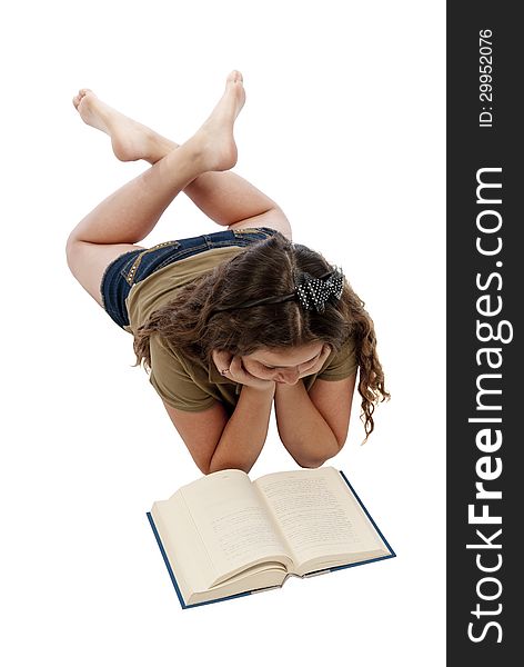 Young teenage girl lying down resting while reading and studying with her legs crossed. Isolated on a white background. Vertical shot. Young teenage girl lying down resting while reading and studying with her legs crossed. Isolated on a white background. Vertical shot.