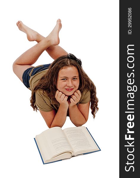 Young teenage girl posing and smiling while reading her book. Vertical shot, isolated on a white background. Studio. Young teenage girl posing and smiling while reading her book. Vertical shot, isolated on a white background. Studio.