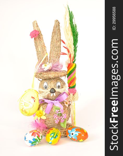 Easter Bunny straw, Easter eggs and palm. Easter Bunny straw, Easter eggs and palm
