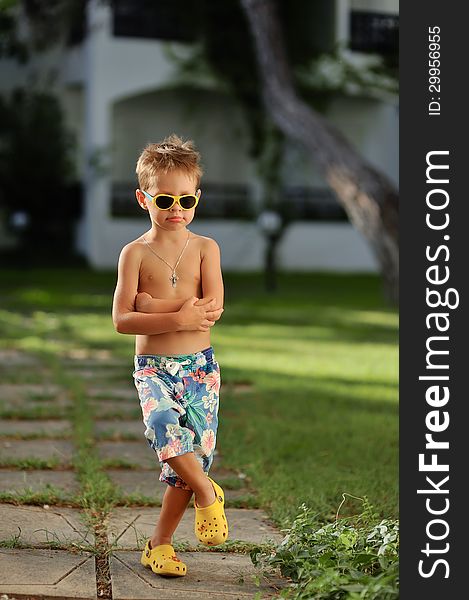 Emotional portrait of a handsome boy in the summer outdoors. Emotional portrait of a handsome boy in the summer outdoors