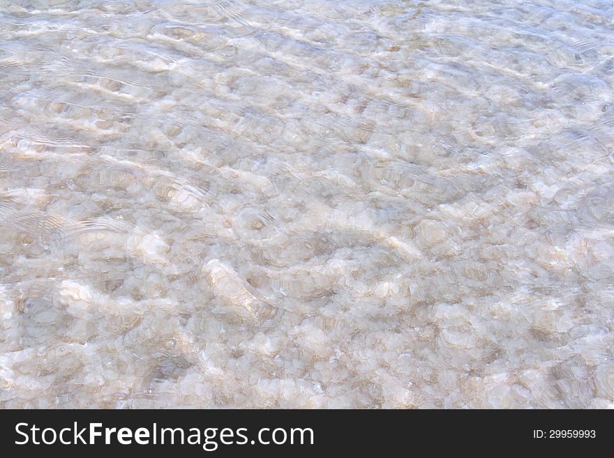 Texture of raw salt on a bottom of a salty lake. Texture of raw salt on a bottom of a salty lake