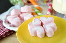 Sweet Heart Marshmallow On Yellow Plate Stock Photos
