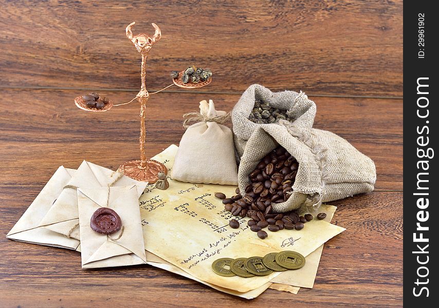 Scales with coffee and tea in burlap sacks. Scales with coffee and tea in burlap sacks