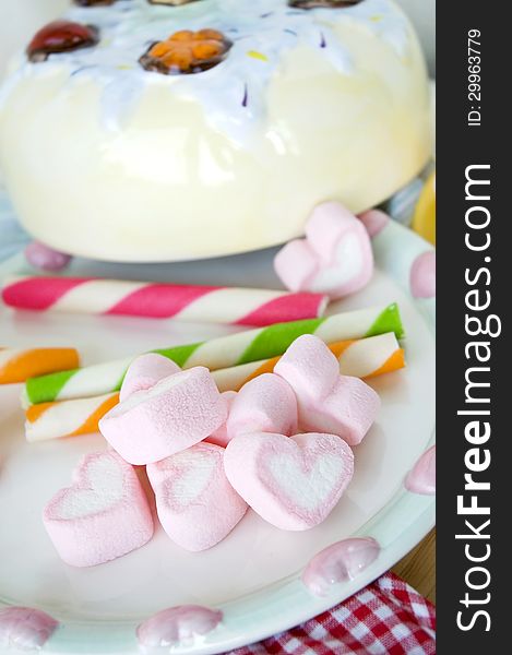 Pink heart marshmallow and colorful wafer stick