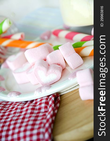 Pink heart marshmallow put on cute plate