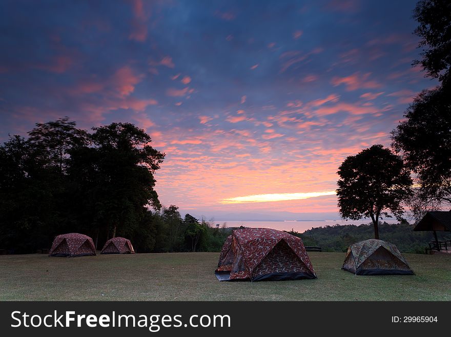 Tents for campers on the hill in the morning in Thailand