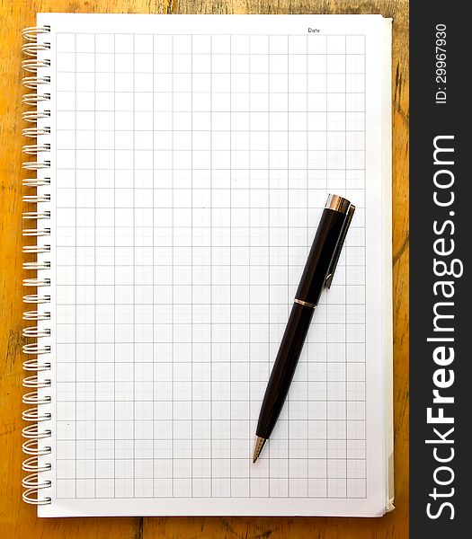 The cross line Note book and black pen