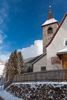 A Wintertime View Of A Small Church With A Tall Steeple Royalty Free Stock Photos