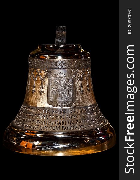 New golden shiny orthodox church bell isolated on black