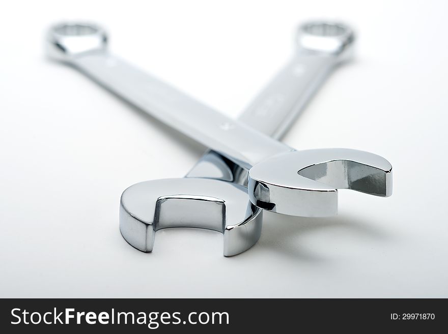 Chrome metal forkwrench on white background. Chrome metal forkwrench on white background