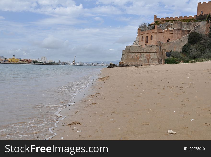 Beach of Portimao with castle, Algarve, Portugal, Europe. Beach of Portimao with castle, Algarve, Portugal, Europe