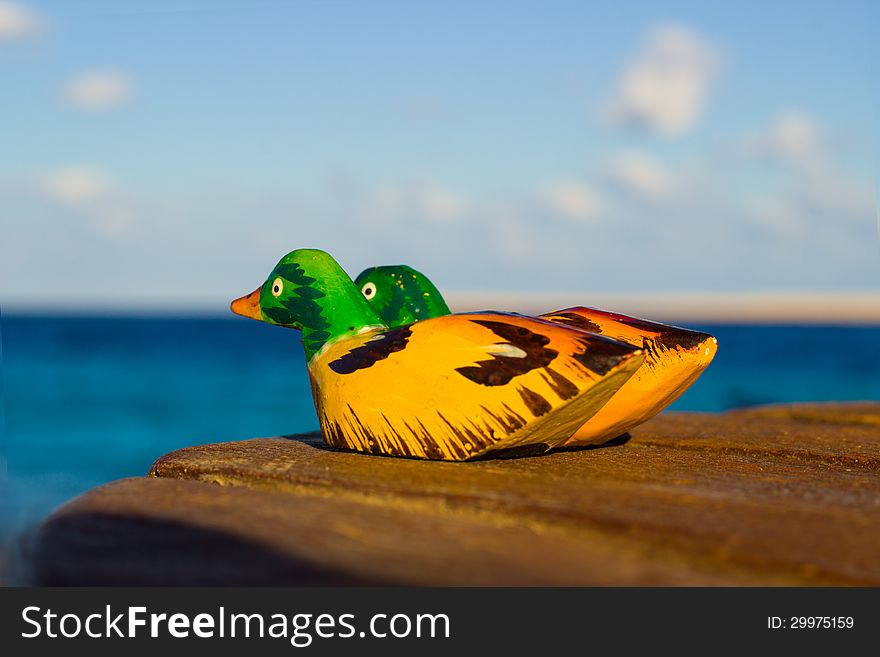 Wooden colorful figurines mandarin duck. Wooden colorful figurines mandarin duck