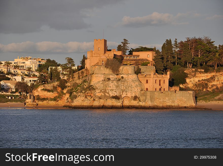 Beach of Portimao with castle, Algarve, Portugal, Europe. Beach of Portimao with castle, Algarve, Portugal, Europe