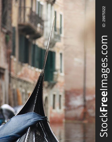 A view from gondola during the ride through the canals of Venice