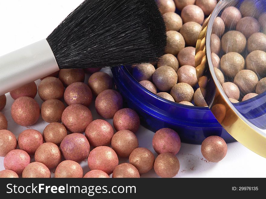 Blush balls and brush close up. Blush balls and brush close up