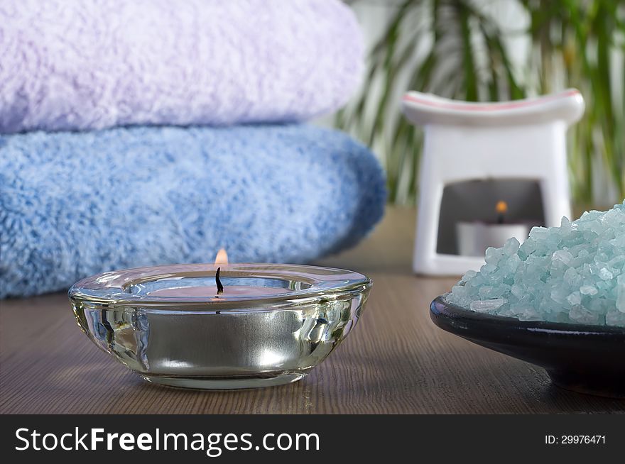 Aromatic spa set with sea salt and colored candles.