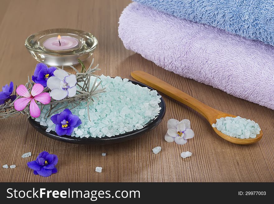 Aromatic spa set with sea salt and colored candles.