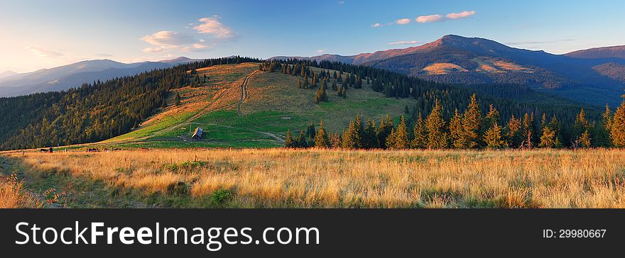 Farm in the mountains. Panorama night landscape. Farm in the mountains. Panorama night landscape