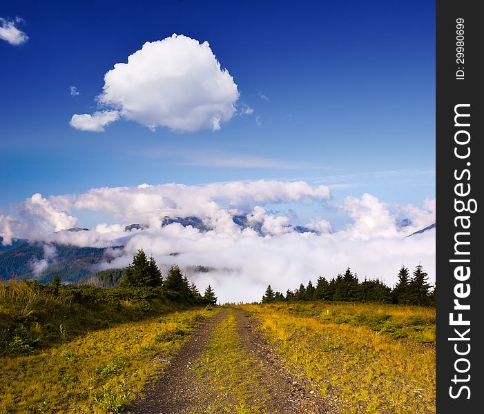 Mountain road leading to the clouds. Mountain road leading to the clouds