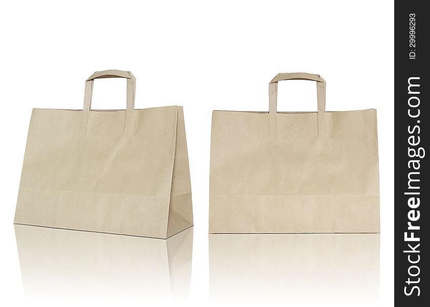 Brown paper bag on reflect floor and white background