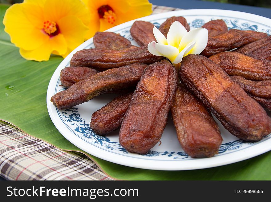 Dry banana bake with honey on plate