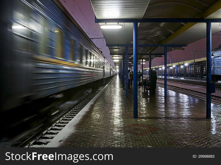 Passenger train at the station in night