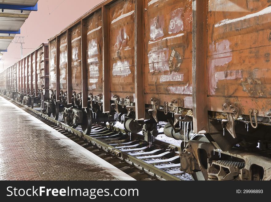 Freight train at the station in night