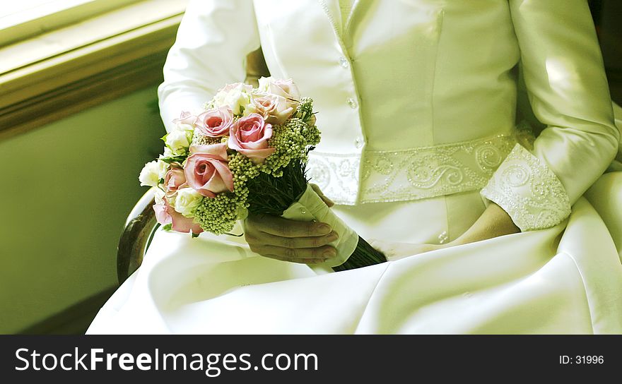 Flowers and her wedding dress