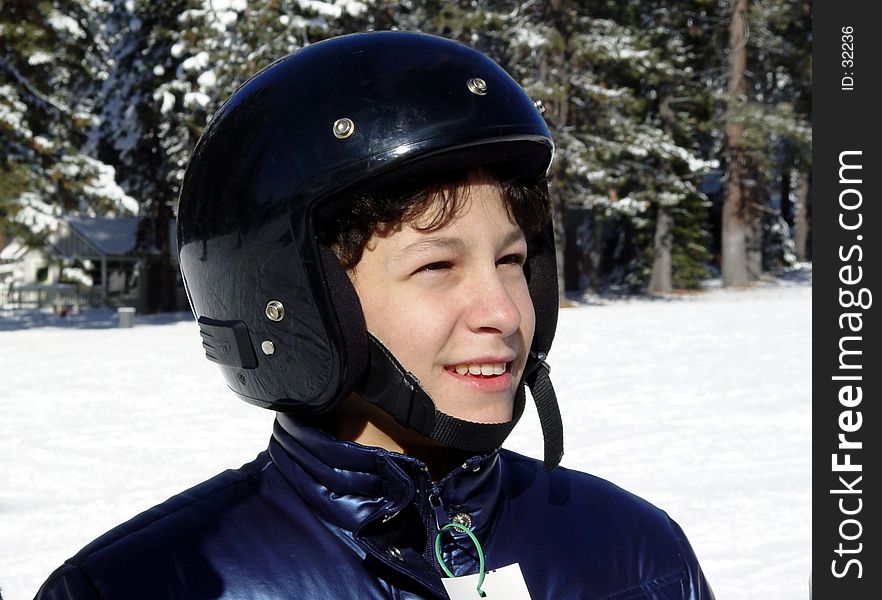 Boy in a helmet in winter