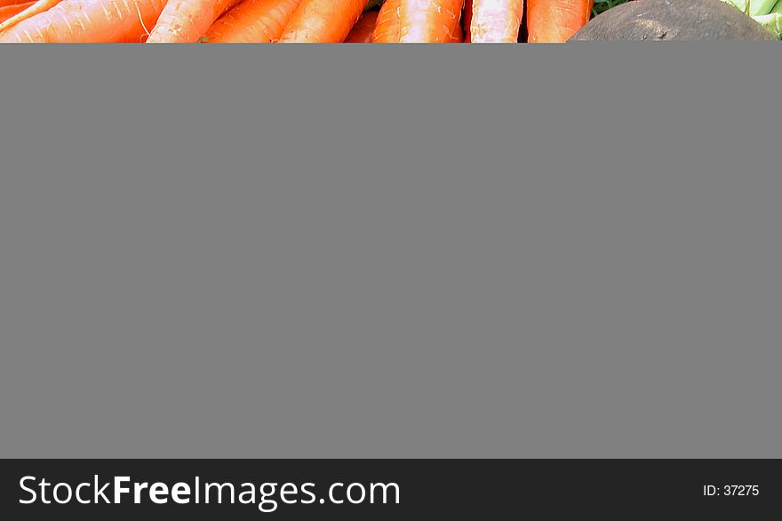 Some carrots and a black radishes-detail. Some carrots and a black radishes-detail