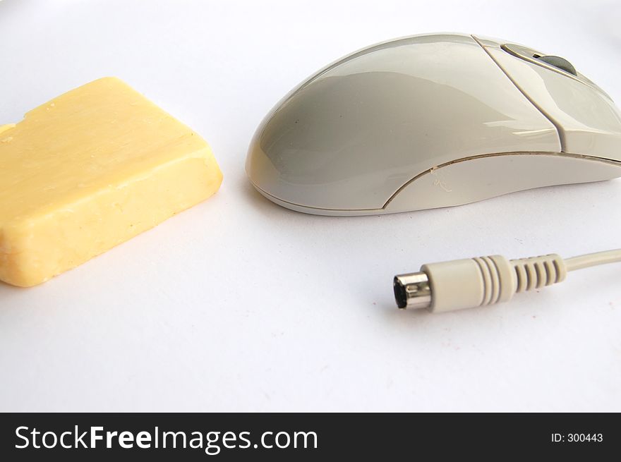 This is an image of an electronic mouse, metaphor for feeding data (cheese). This is an image of an electronic mouse, metaphor for feeding data (cheese).