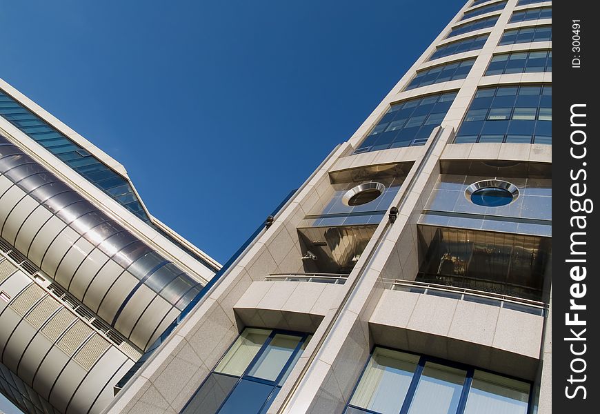 High modern building over the blue sky. High modern building over the blue sky