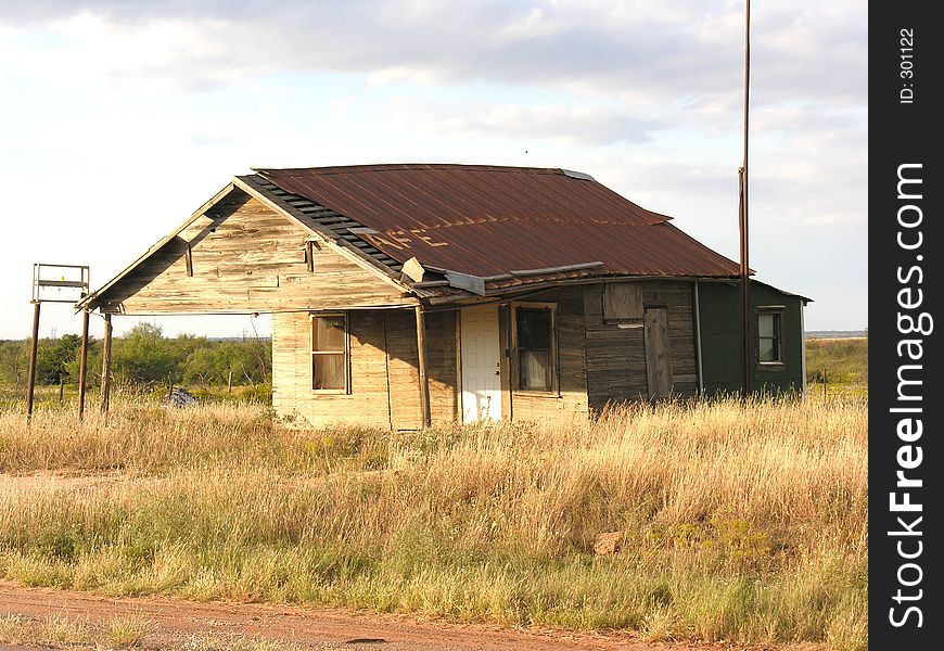 Leaning towards collapse, an abandoned cafe in northwestern Oklahoma remembers better days. Leaning towards collapse, an abandoned cafe in northwestern Oklahoma remembers better days.